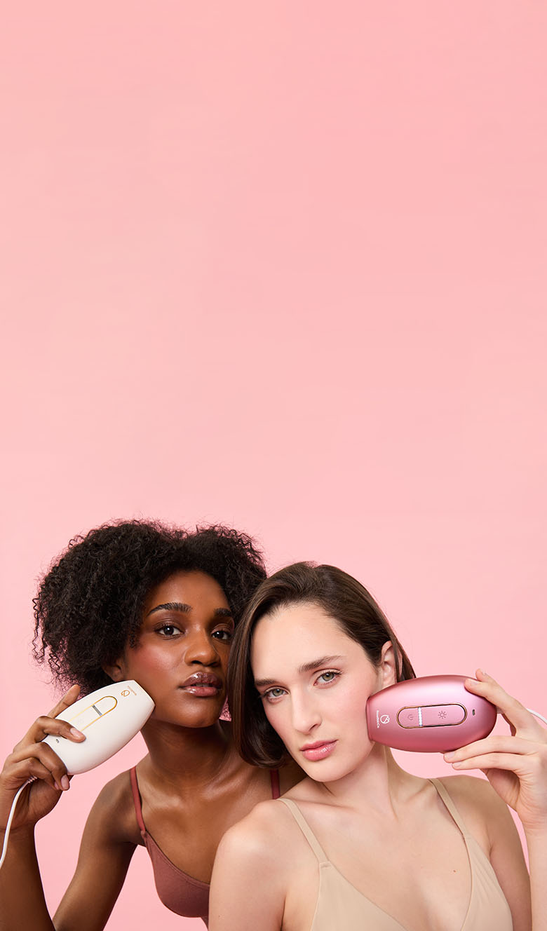 Two women using Lumi's on their faces